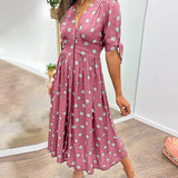 Lina - Elegantes Kleid mit Punkten