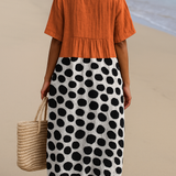 Petra - Orangenes Kleid mit Kontrastpunkten