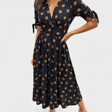 Lina - Elegantes Kleid mit Punkten